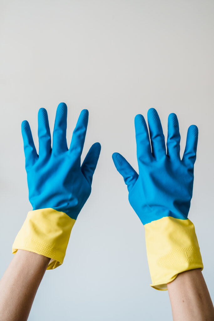 A person wearing rubber gloves