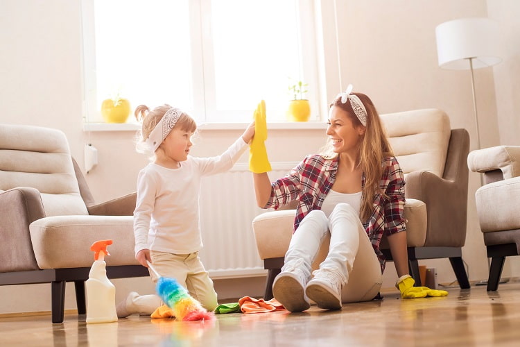 kid high fiving mom