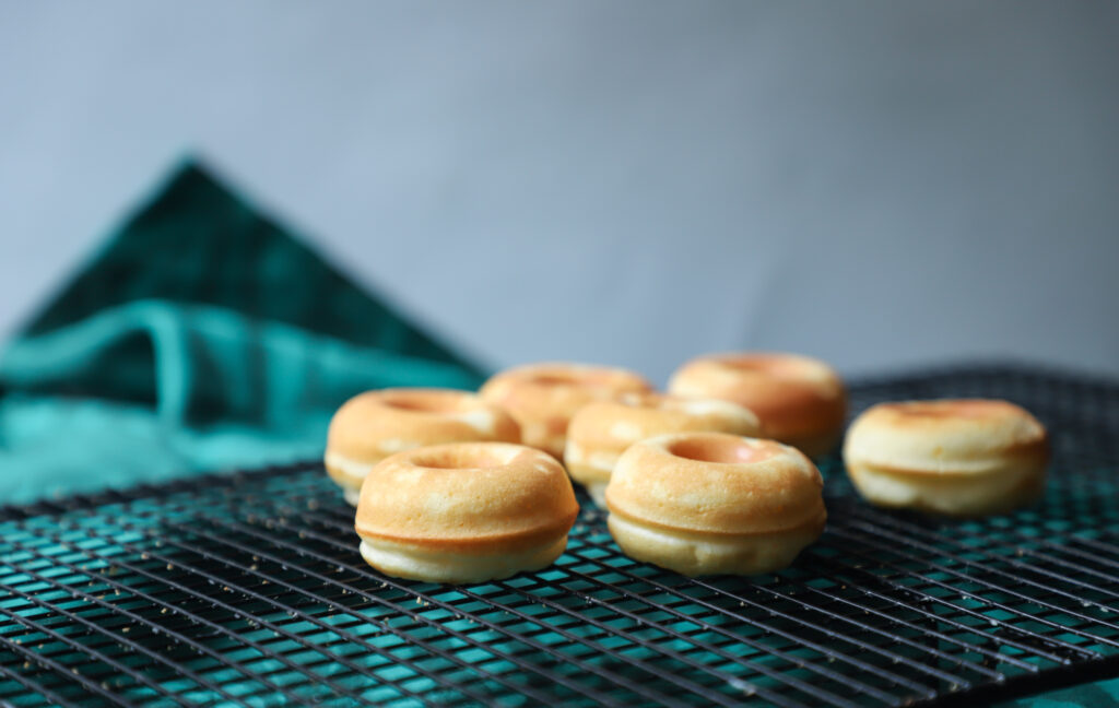 Baked macaroons on black grill