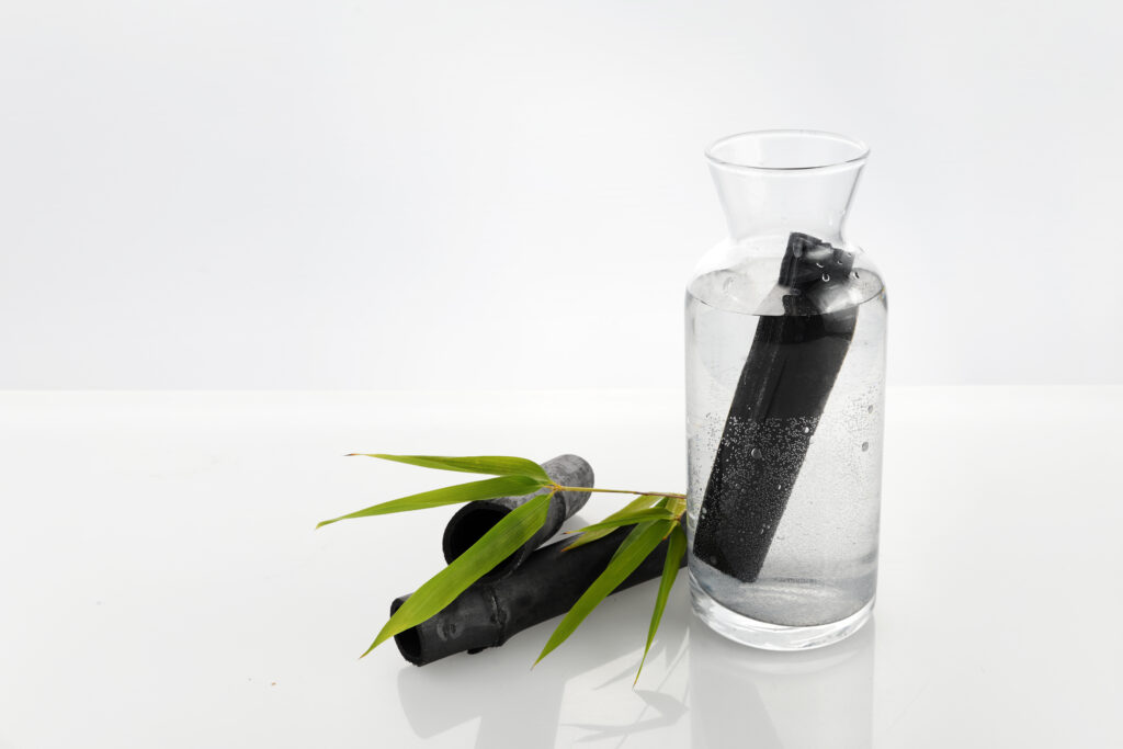 Natural Bamboo charcoal water filter. Deodorization, air filtration, and purifier water concept.