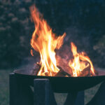 Photography of wood burning on fire pit