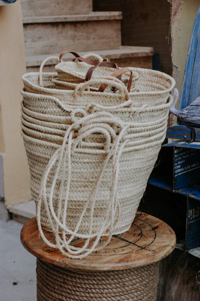 White woven basket on brown wooden table