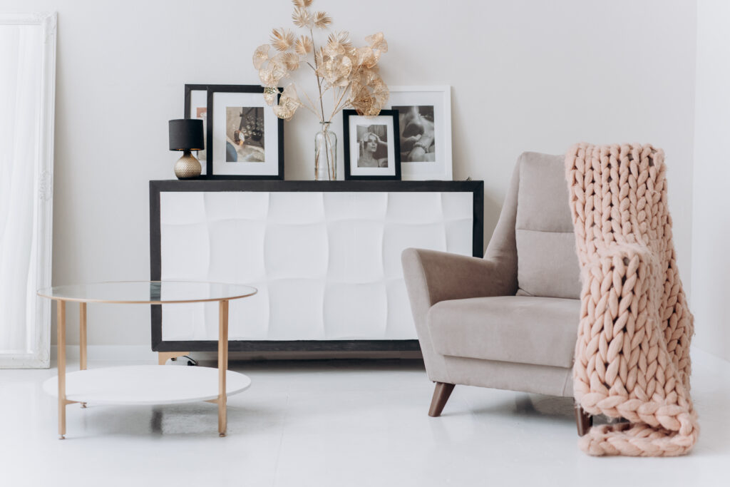 Beige sofa chair near a table