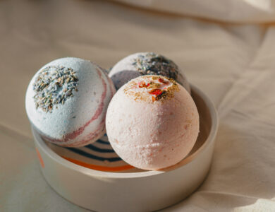 Collection of fragrant bath bombs in bowl