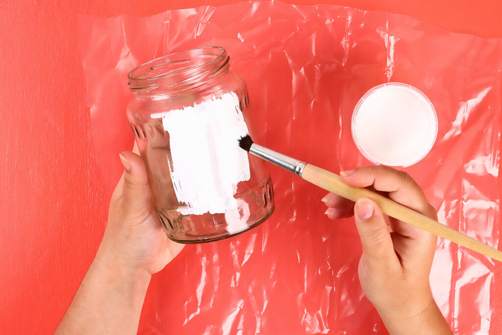 Diy vase 4th of July glass jar, acrylic paint, glitter, tape color American flag red blue white