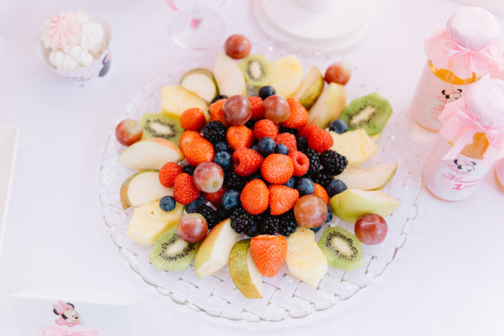 Fruit plate with strawberries, kiwi, grapes, blueberries, blackberries