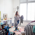 Teenage girl in messy room