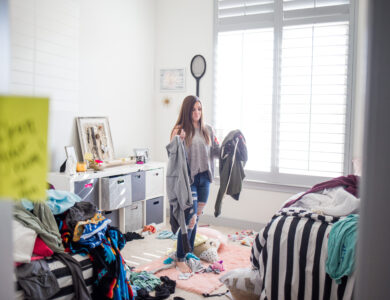 Teenage girl in messy room