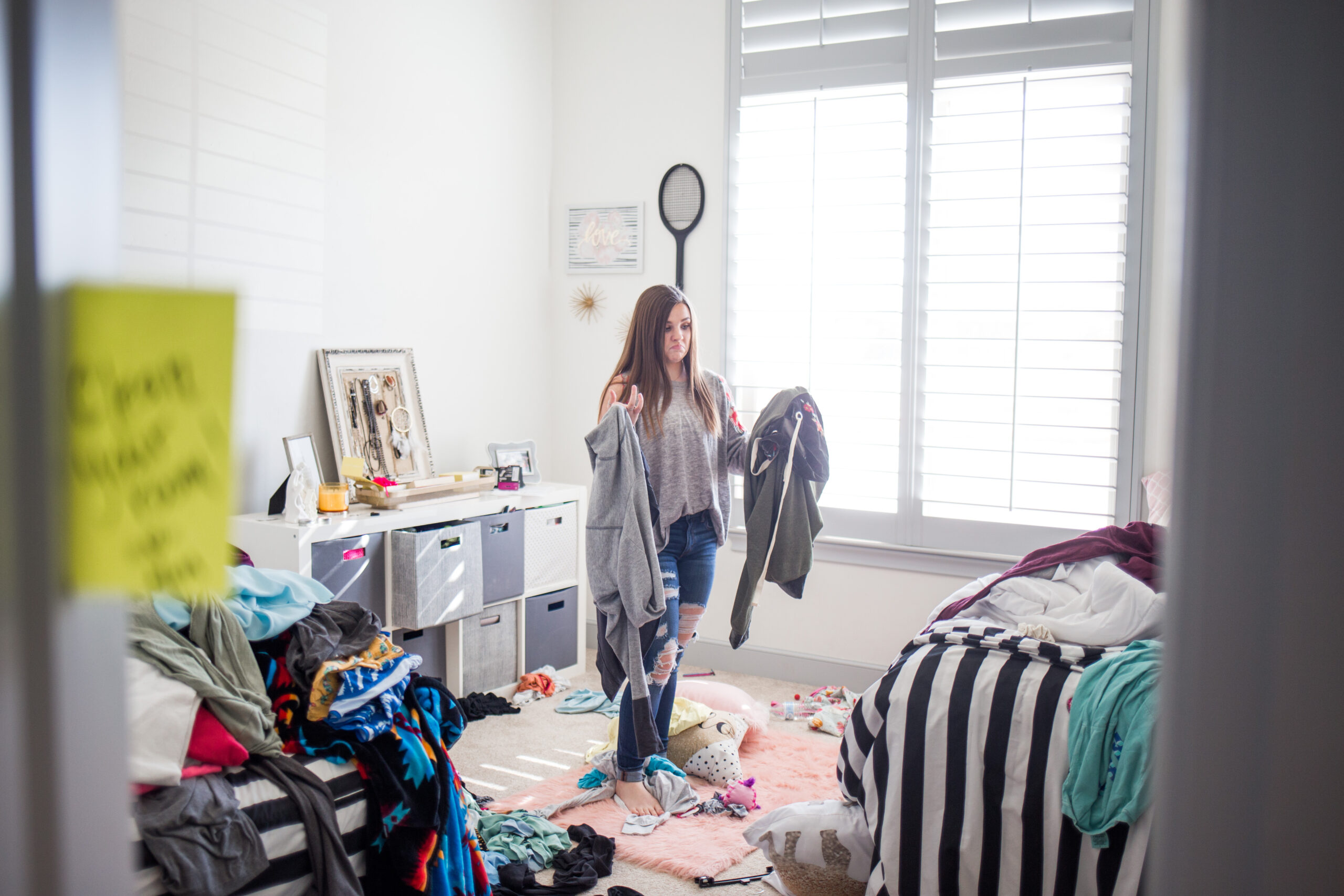 Teenage girl in messy room