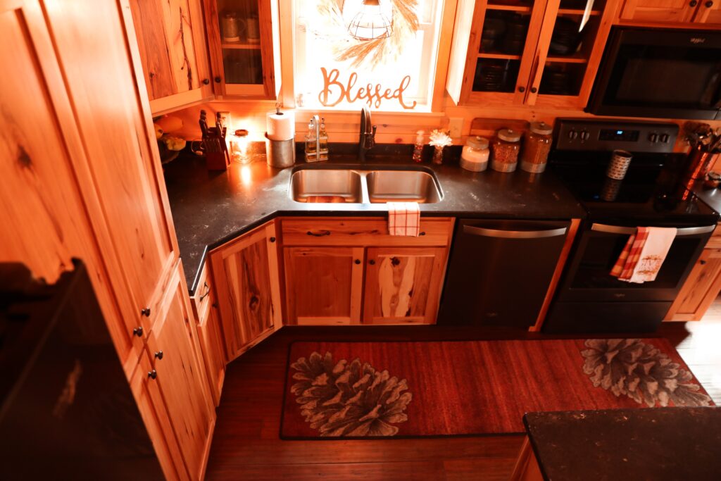 brown wooden kitchen cabinet with sink