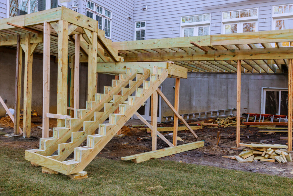 Installing deck boards with above ground deck, patio construction.