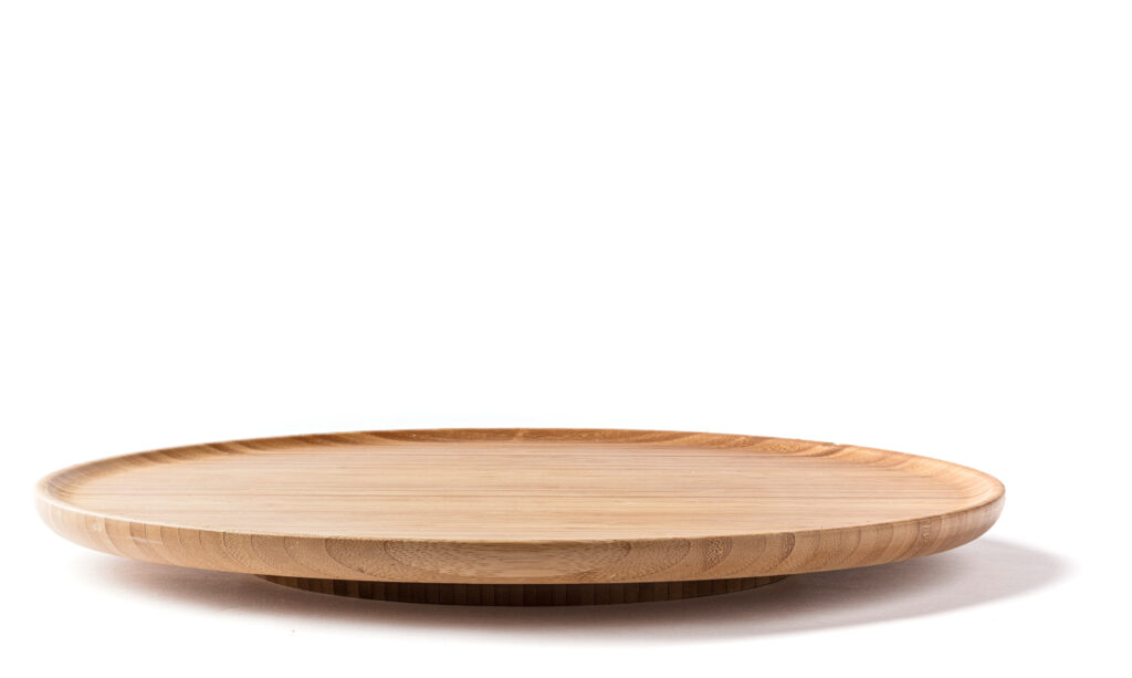 Bamboo lazy susan on a white background side view