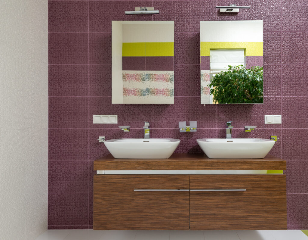 Interior of bathroom with colorful wall