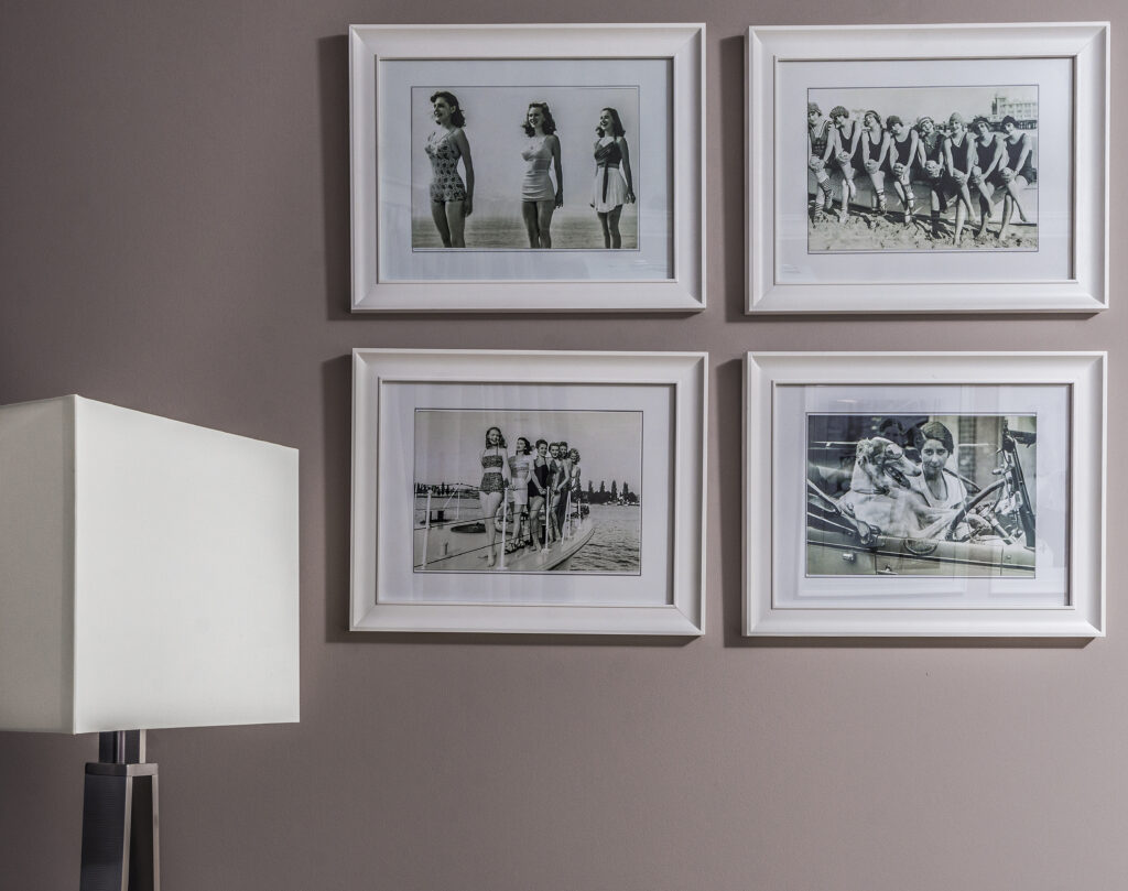 Collection of framed photos on wall