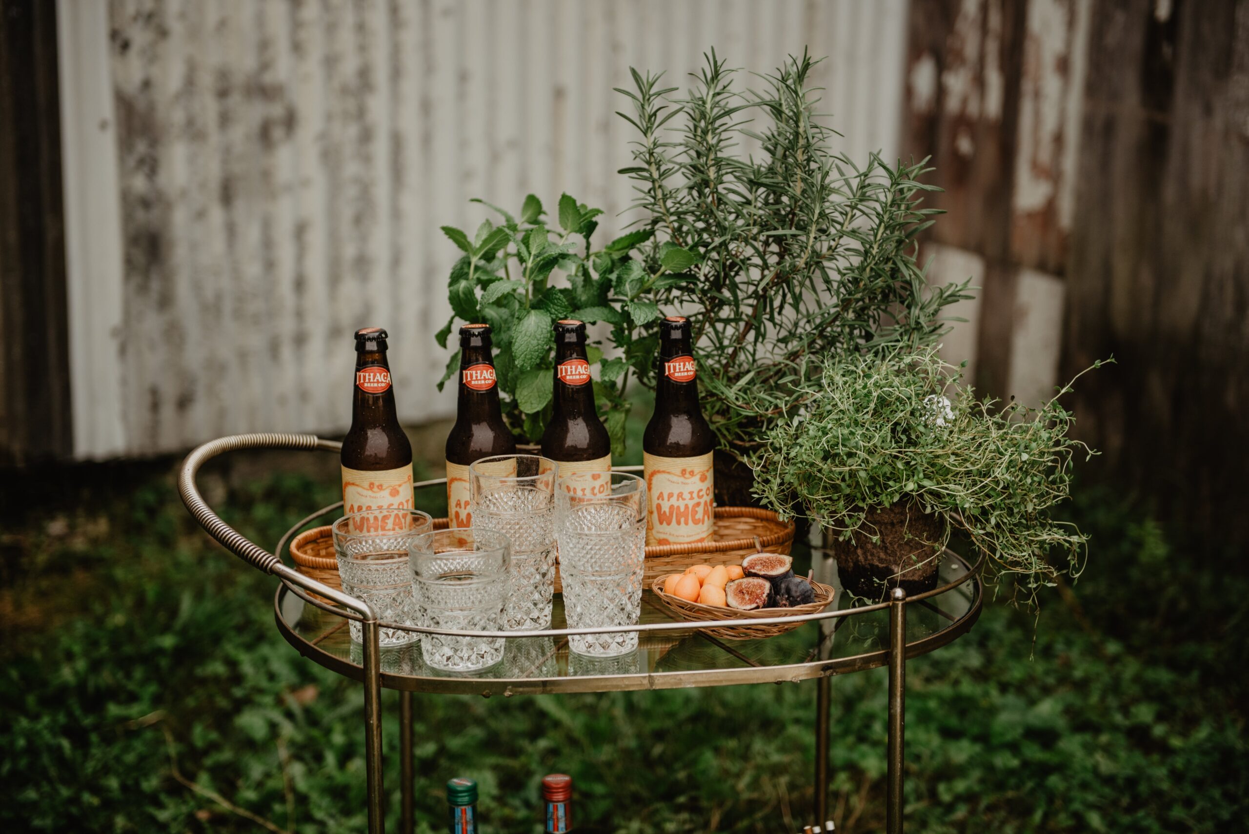 Four beer bottles on cart