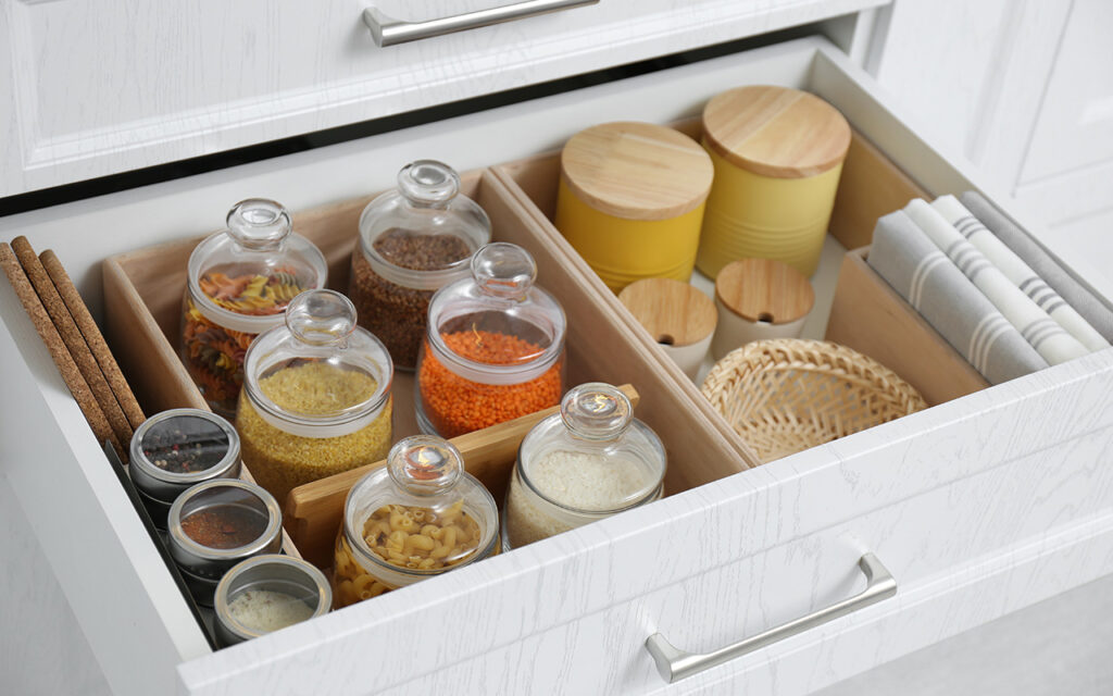 Organized kitchen cupboard with spices