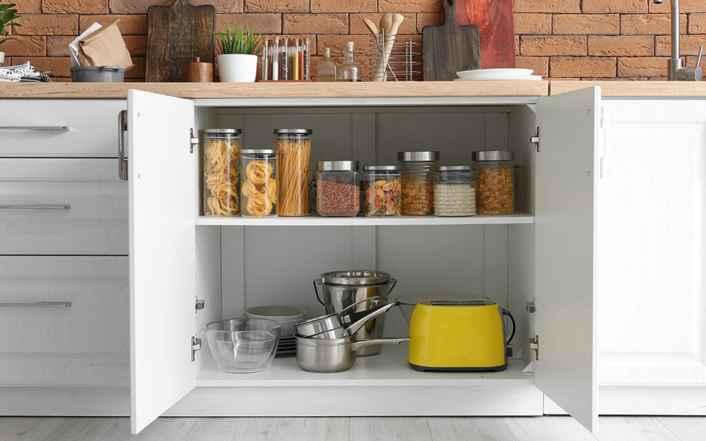 Kitchen cupboards with organized food storage