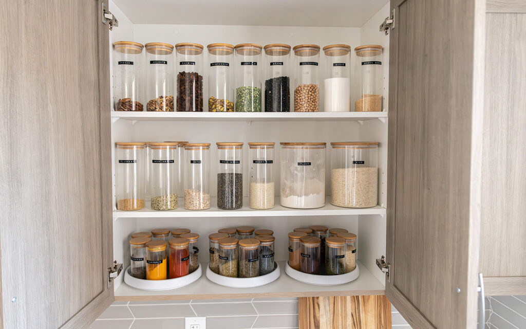 Clean kitchen pantry with organized food