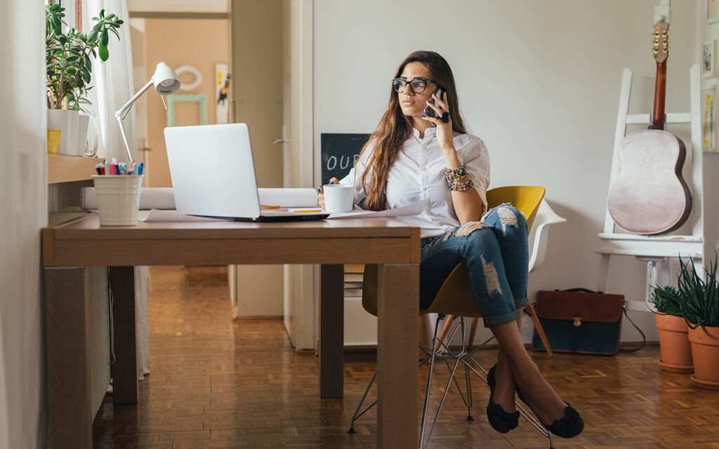 Woman working in her home office