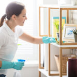 Woman cleaning her house