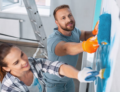 Couple working on refurbishing a house