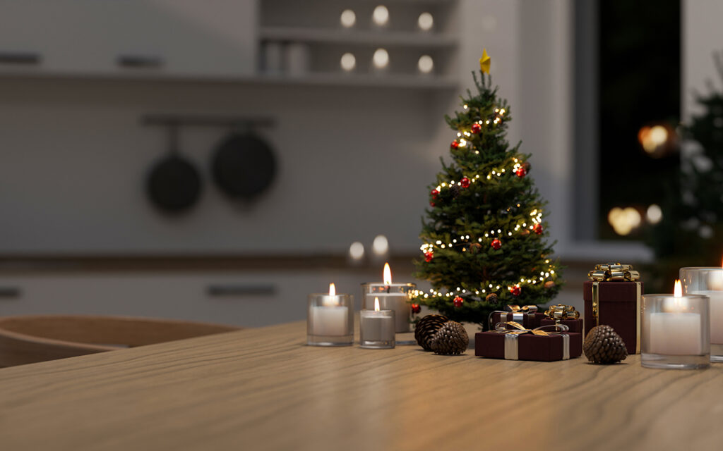 Small Christmas tree surrounded by candles 