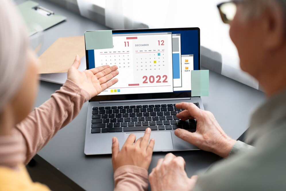Older couple using a computer