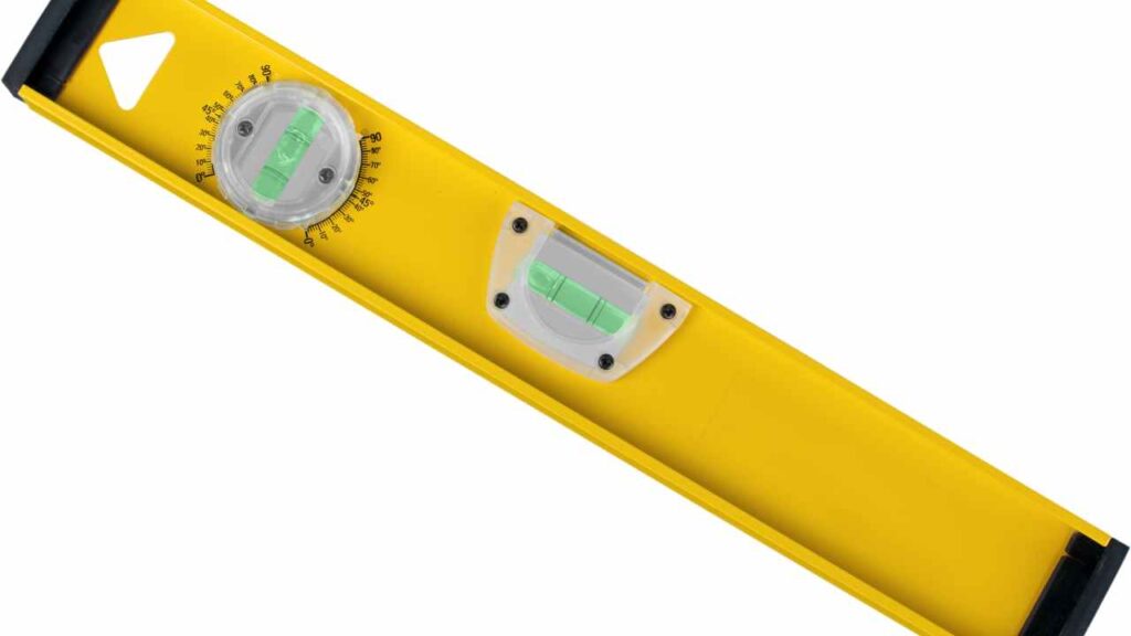 a yellow spirit level on a white background