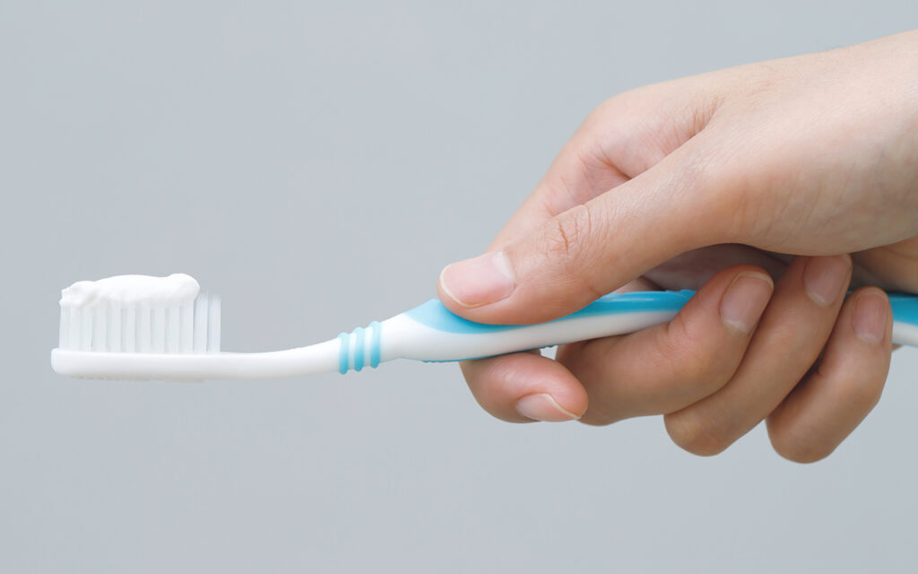 Toothpaste on toothbrush 