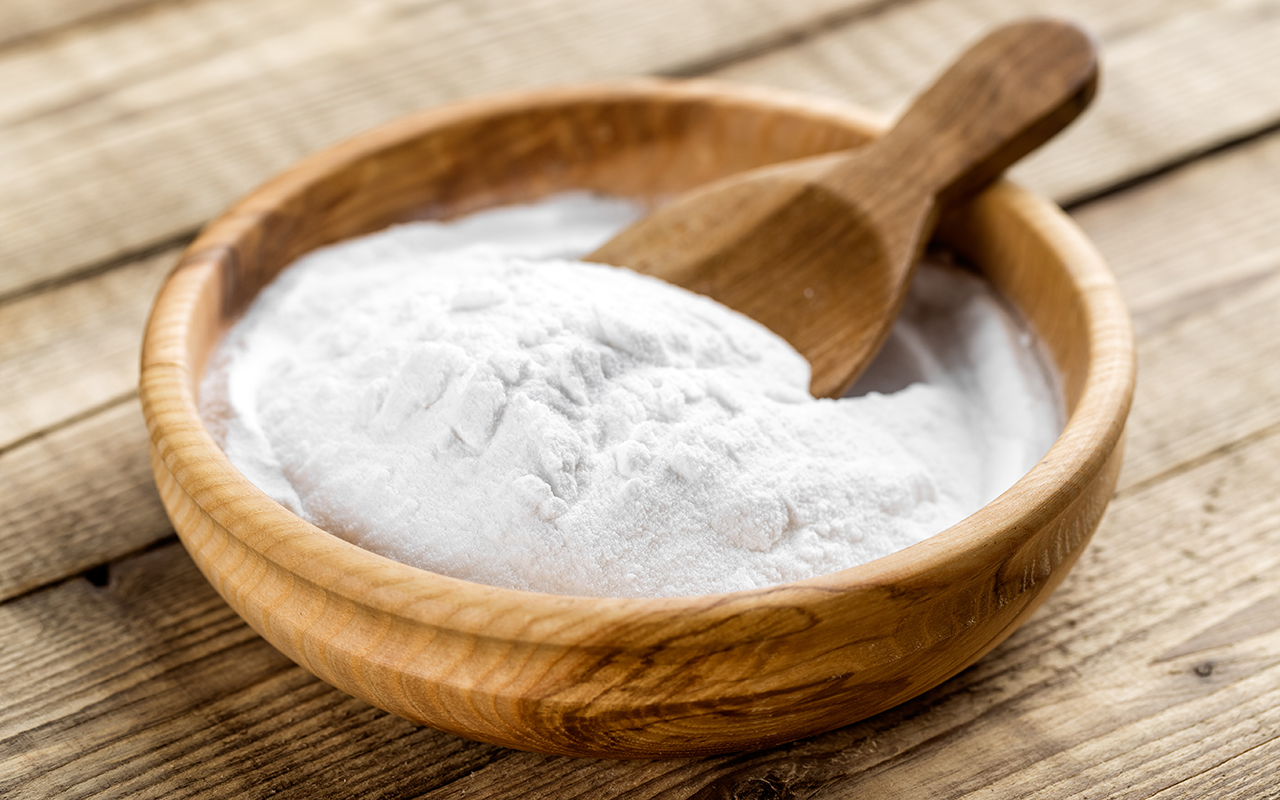 Baking soda in a wooden bowl