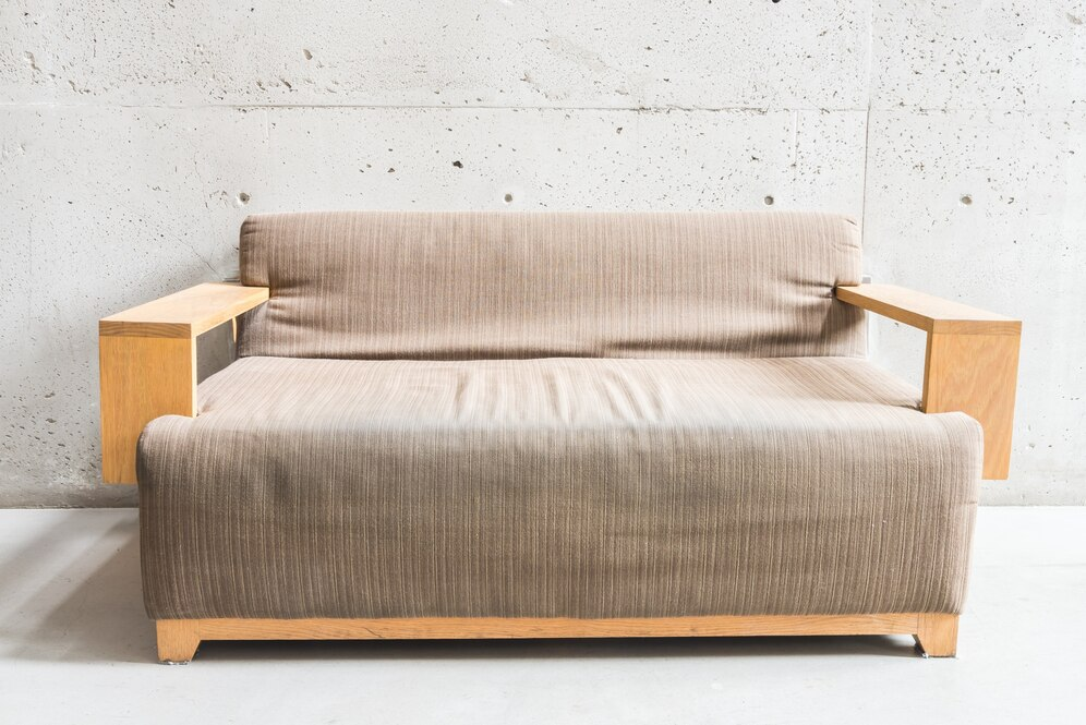 couch with wooden armrests 