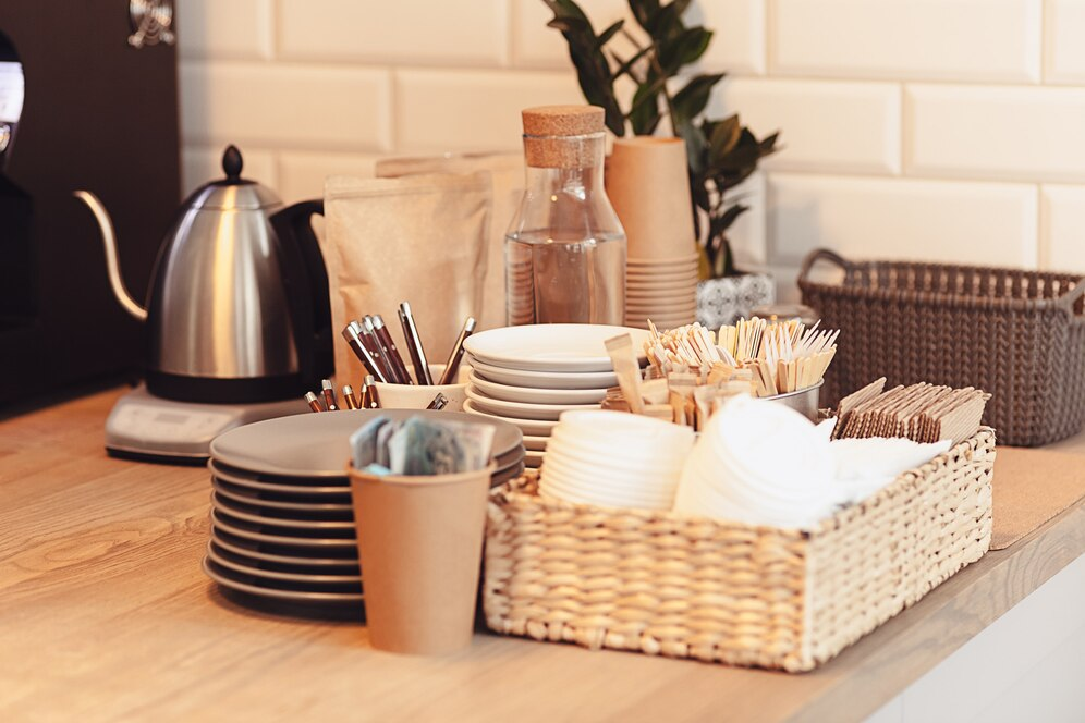 Kitchen drink station with cups, lids and stir sticks