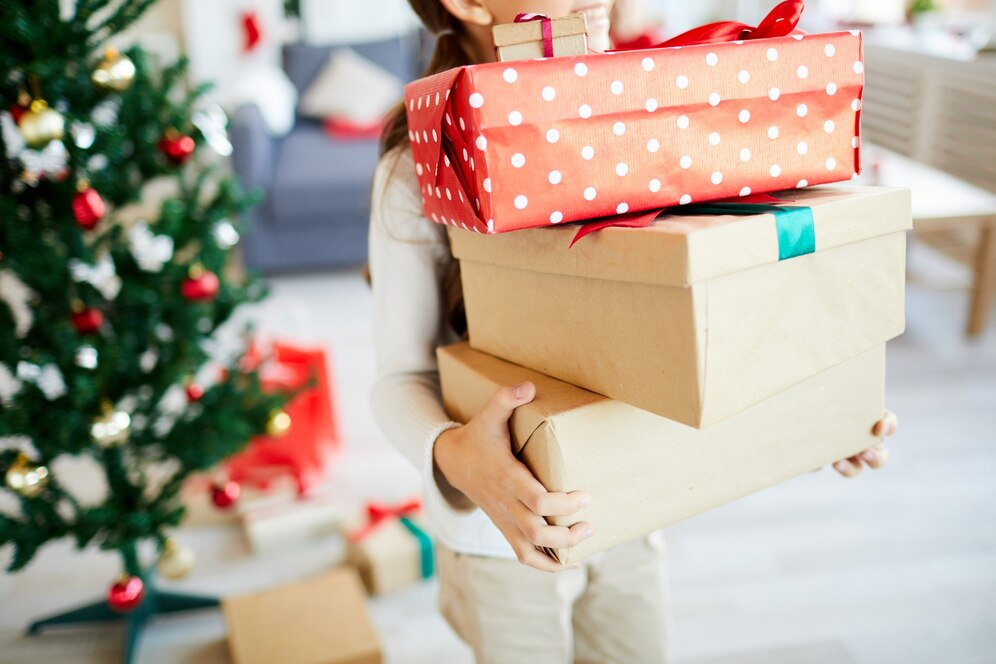 woman carrying presents