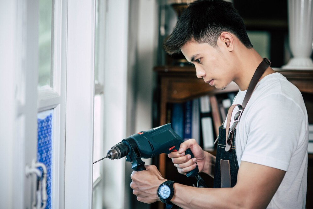 Man using a power drill