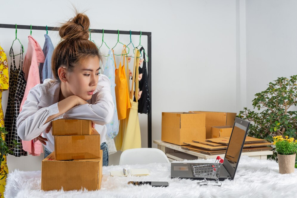 Woman packing online orders