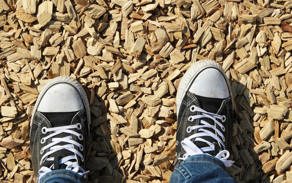 Shoes on wood chips