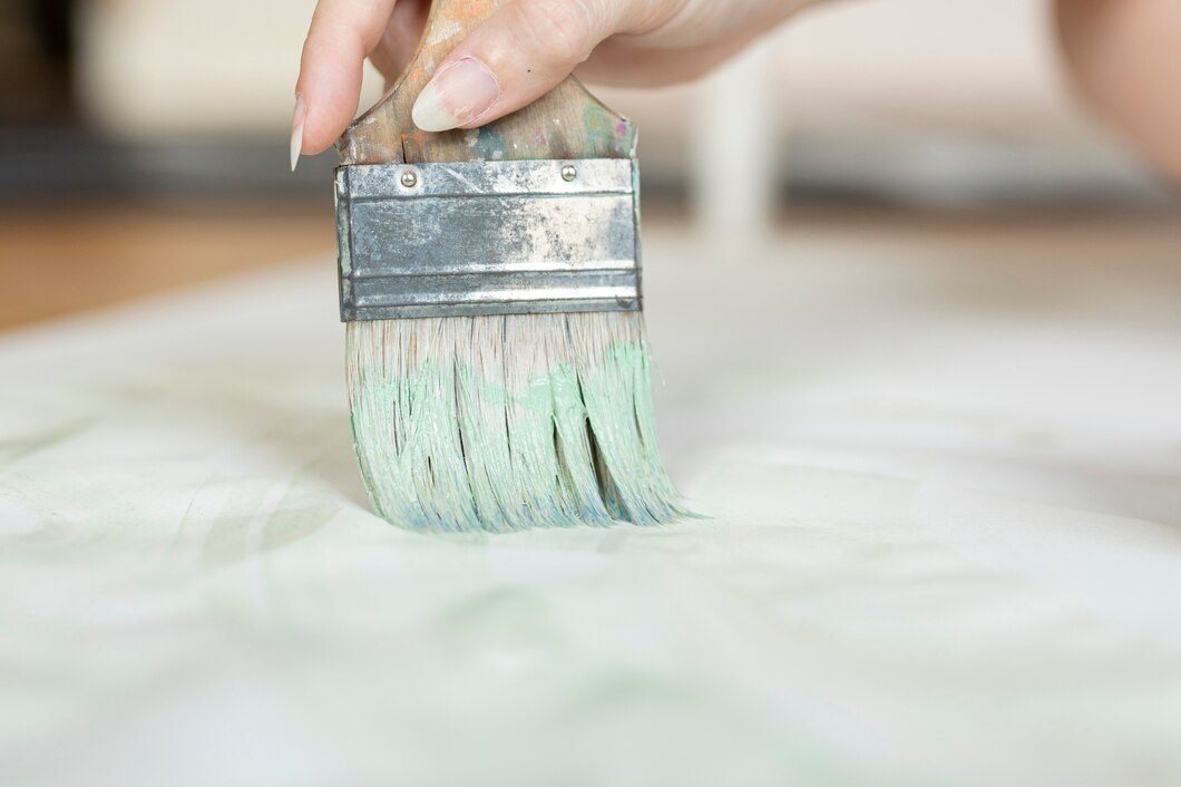 Paint brush with green paint