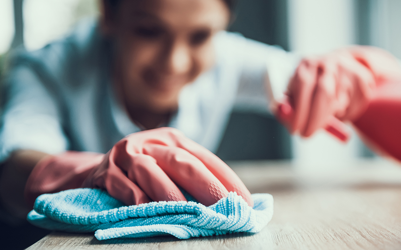 woman cleaning her kitchen