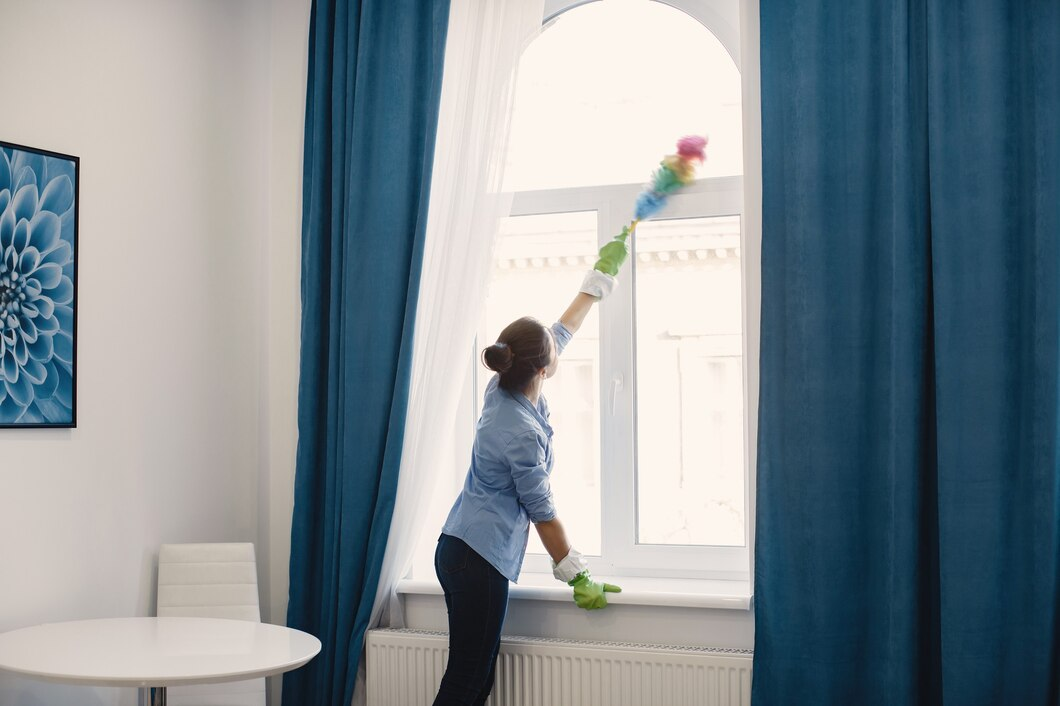 Woman cleaning windows
